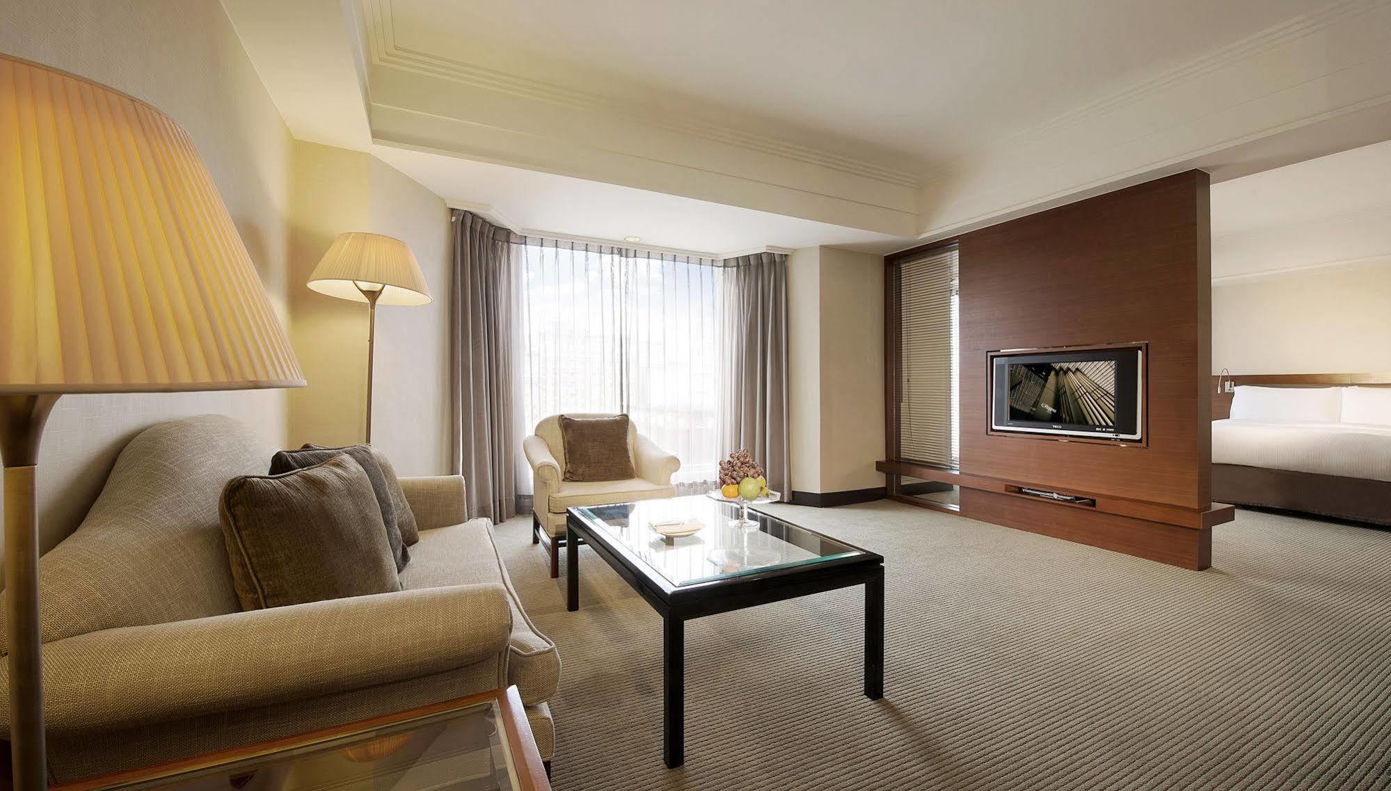 Hotel Regent Taipéi Exterior foto A living room in a hotel suite